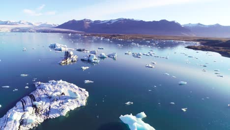 Aerial-over-icebergs-in-the-Arctic-Jokulsarlon-glacier-lagoon-in-Iceland-1