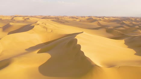 Astonishing-vista-aérea-shot-over-the-vast-sand-dunes-of-the-Namib-Desert-along-the-Skeleton-Coast-of-Namibia-2