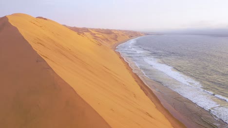 Astonishing-aerial-shot-over-the-vast-sand-dunes-of-the-Namib-Desert-along-the-Skeleton-Coast-of-Namibia-7