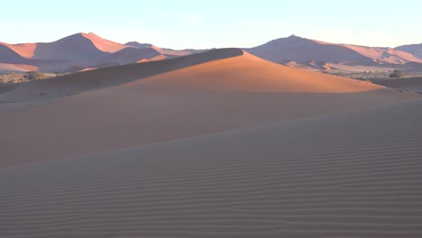 Establishing-shot-of-Namib-Naukluft-National-Park-in-the-Namib-desert-and-massive-sand-dunes-dawn-Namibia