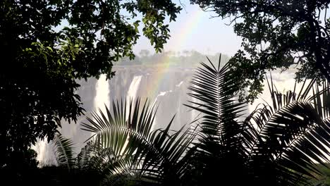 Beautiful-establishing-shot-with-rainbow-of-Victoria-Falls-and-jungle-from-the-Zimbabwe-side-of-the-African-waterfall