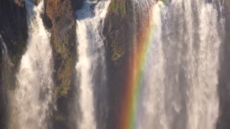 Beautiful-close-establishing-shot-with-rainbow-of-Victoria-Falls-and-jungle-from-the-Zimbabwe-side-of-the-African-waterfall-2