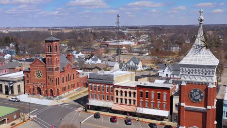 Aerial-of-a-tree-growing-out-of-the-top-of-a-county-courthouse-in-Greensburg-Indiana-2