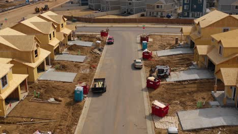 Good-aerial-over-a-neighborhood-of-homes-under-construction-in-the-suburbs--1