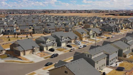 Good-aerial-over-a-neighborhood-of-identical-homes-under-construction-in-the-suburbs--1