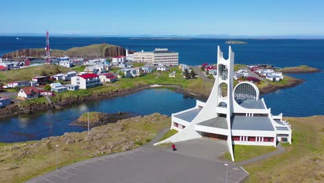 Aerial-over-a-modernist-Christian-church-in-stykkisholmur-Iceland-1