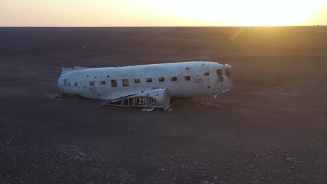 Aerial-over-a-crashed-US-Navy-DC-3-on-the-black-sands-of-Solheimasandur-Iceland-1