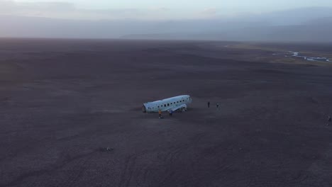 Aerial-over-a-crashed-US-Navy-DC-3-on-the-black-sands-of-Solheimasandur-Iceland-5