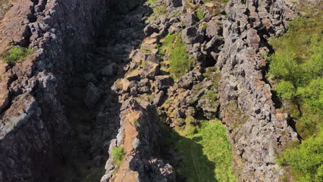 Tilt-up-aerial-over-the-mid-Atlantic-Ridge-tectonic-plate-at-Thingvellir-Iceland