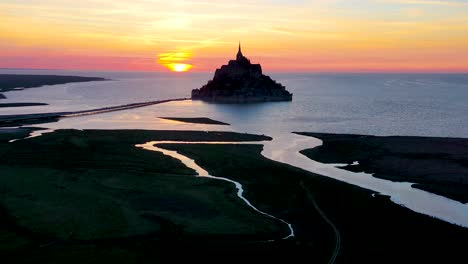 Amazing-aerial-of-Mont-Saint-Michel-France-silhouetted-at-sunset-1