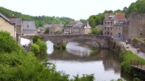 Establishing-the-pretty-town-of-Dinan-France-with-tourists-and-bicycles-1