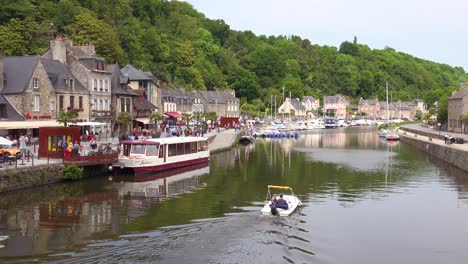 Establishing-the-pretty-town-of-Dinan-France-with-boat-on-Rance-River