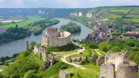 Beautiful-aerial-over-a-ruined-fort-or-Chateau-on-a-hilltop-overlooking-the-Seine-River-in-Les-Andelys-France