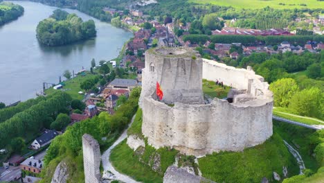 Beautiful-aerial-over-a-ruined-fort-or-Chateau-on-a-hilltop-overlooking-the-Seine-River-in-Les-Andelys-France-1
