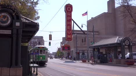 Memphis-trolley-car-on-a-busy-street-outside-the-Orpheum-Theater-performing-arts-center