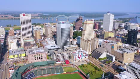 Good-aerial-of-downtown-Memphis-Tennessee-high-rises-skyscrapers-businesses-skyline-stadium-and-Mississippi-River