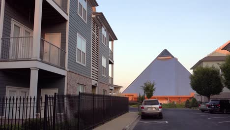 Establishing-shot-of-a-generic-apartment-complex-with-Memphis-pyramid-background