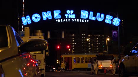 Establishing-night-and-crowds-on-Beale-Street-Memphis-Tennessee-with-neon-signs-bars-and-clubs-3