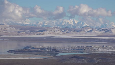 Time-lapse-beautiful-panoramic-shot-of-snow-covered-winter-mountains-in-the-Eastern-Sierra-Nevada-mountains-and-Mono-Lake-California
