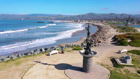 2020---aerial-of-mermaid-statue-and-abandoned-beaches-of-Ventura-southern-california-during-covid-19-coronavirus-epidemic-as-people-stay-home-en-masse-1