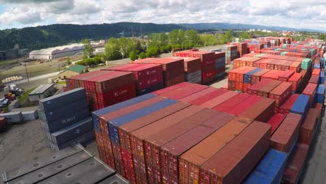 An-aerial-over-a-rail-freight-yard-with-containers-in-transit-3