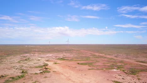 Aerial-drone-shot-of-wind-power-windmills-in-the-desert-outback-of-Coober-Pedy-Australia