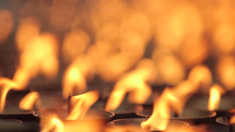 Beautiful-prayer-candles-burn-at-a-Buddhist-temple