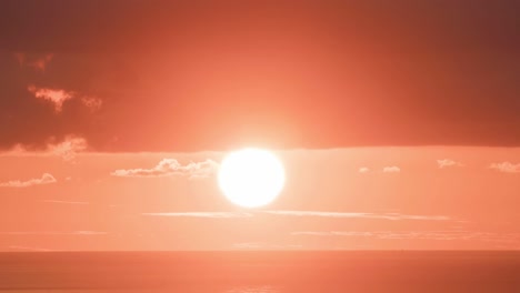 The-sun-sets-in-a-huge-orange-ball-in-time-lapse-1