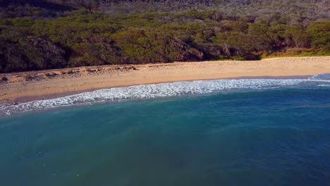 Nice-aerial-shot-over-Molokai-Hawaii-beach-and-coastline-3