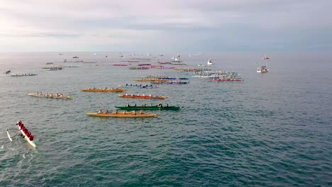 Beautiful-aerial-over-many-outrigger-canoes-at-the-start-of-a-race-in-Hawaii-1