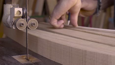 A-woodworker-works-in-his-studio