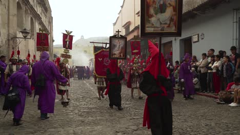 Priests-carry-religious-placards--in-a-colorful-Christian-Pascua-celebration-in-Antigua-Guatemala