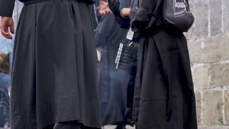 Robed-priests-wave-incense-burners-in-a-colorful-Christian-Easter-celebration-in-Antigua-Guatemala