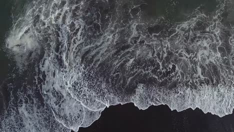Beautiful-straight-down-aerial-over-ocean-waves-1