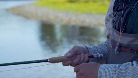 Close-up-shot-of-a-fly-fisherman-with-excellent-technique-working-his-rod-and-reel