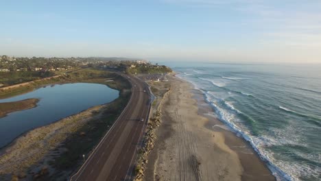 High-aerial-over-the-California-coastline-and-highway-near-San-Diego-2