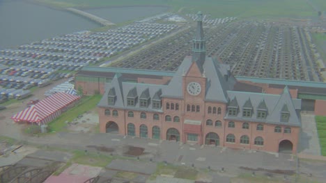 Helicopter-aerial-over-closed-Ellis-Island-Central-New-Jersey-Railroad-building-now-abandoned