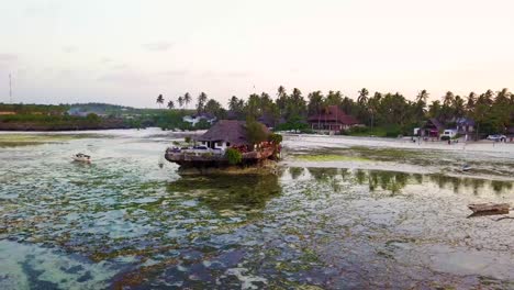 A-small-hut-restaurant-or-bar-on-a-beach-near-Stonetown-Zanzibar-Africa-1