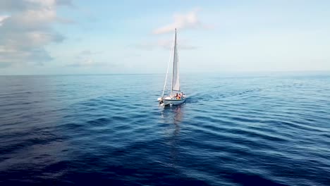 Beautiful-vista-aérea-of-a-sailboat-sailing-across-the-Caribbean-ocean-sea-near-the-island-of-St-Lucia-3