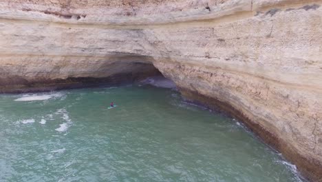Aerial-of-Lagos-kayak-into-cave-in-Portugal