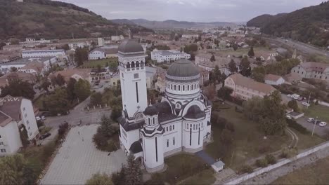 Aerial-over-a-church-in-Sighisoara-Castrum-Sex-in-Romania-birthplace-of-Dracula