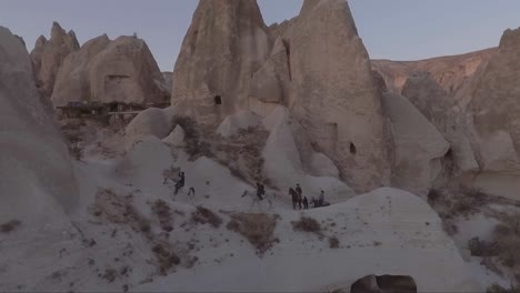 Aerial-of-tourists-riding-horses-horseback-riding-at-Cappadocia-Turkey-4