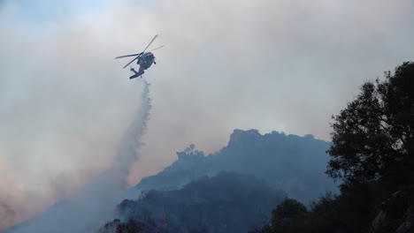 A-Helicopter-Makes-Water-Drops-During-The-Woolsey-Fire-Near-Malibu-California-1