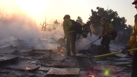 Ground-Fire-Burns-As-Firefighters-Battle-A-Burning-Structure-During-The-Easy-Fire-Wildfire-Disaster-In-The-Hills-Near-Simi-Valley-Southern-California-5