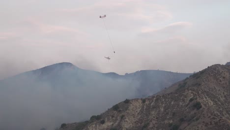 Helicopters-Make-Water-Drops-On-A-Brush-Fire-In-The-Hills-Of-Southern-California-Firefighting-Efforts