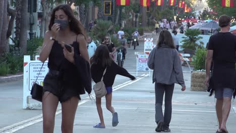 People-Walk-And-Dine-Outdoors-On-The-Street-In-Santa-Barbara-California-During-The-Coronavirus-Covid-19-Epidemic-Pandemic-Outbreak