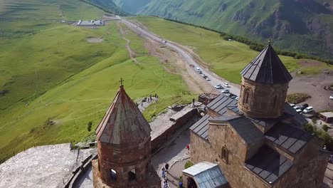 Aerial-Around-The-Gergeti-Monastery-And-Church-Overlooking-The-Caucasus-Mountains-In-The-Republic-Of-Georgia-2