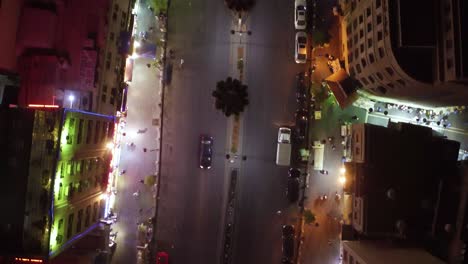 Low-Night-Vista-Aérea-Straight-Down-Following-Cars-Over-The-Old-City-Of-Amman-Jordan-With-Buildings-Traffic-And-Cars-On-Road