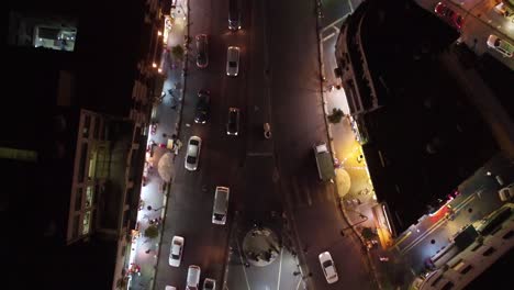 Low-Night-Vista-Aérea-Straight-Down-Following-Cars-Over-The-Old-City-Of-Amman-Jordan-With-Buildings-Traffic-And-Cars-On-Road-2