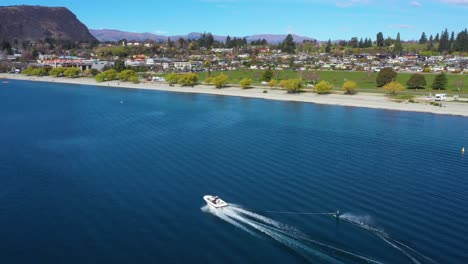 Aerial-Over-A-Water-Skier-Water-Skiing-On-Lake-Wakatipu-In-The-South-Island-Of-New-Zealand